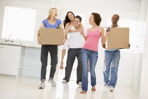 Professional movers handling a flat removal in Fulham on a residential street