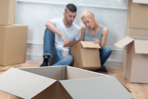 Careful loading of household furniture for a move in Fulham