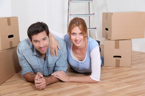 Student house move with careful handling of bags, boxes, and a desk in Fulham