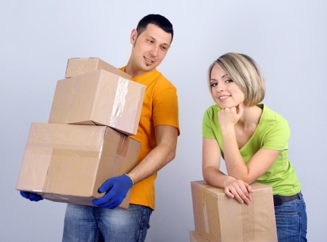 Packing and loading furniture into a moving truck in Fulham