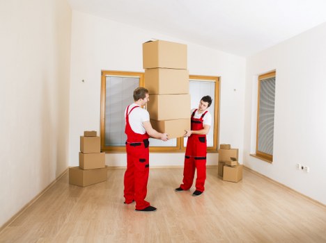 A family preparing for a home move in a Fulham apartment